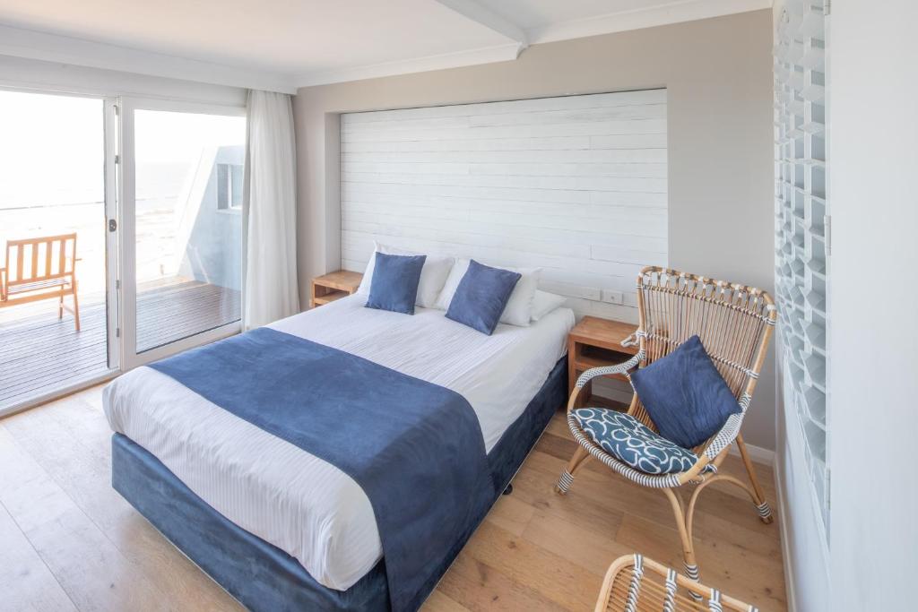 Letto o letti in una camera di Ocean Front Motel