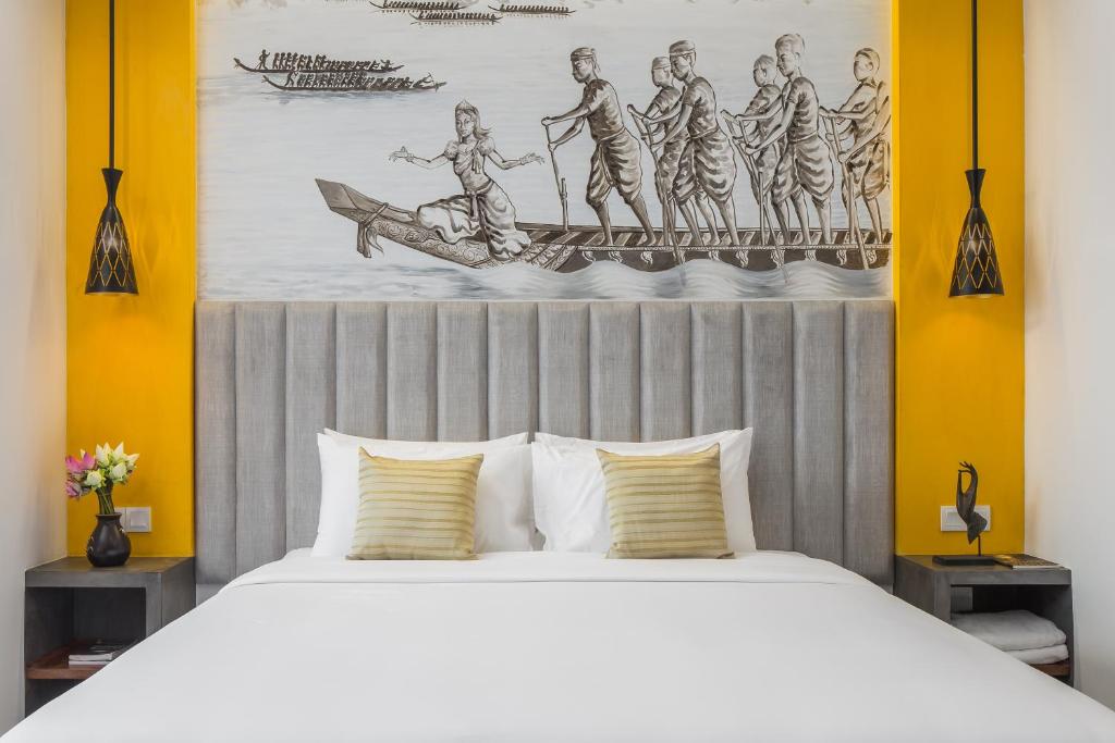 Postel nebo postele na pokoji v ubytování Siem Reap Palace Hotel & Spa
