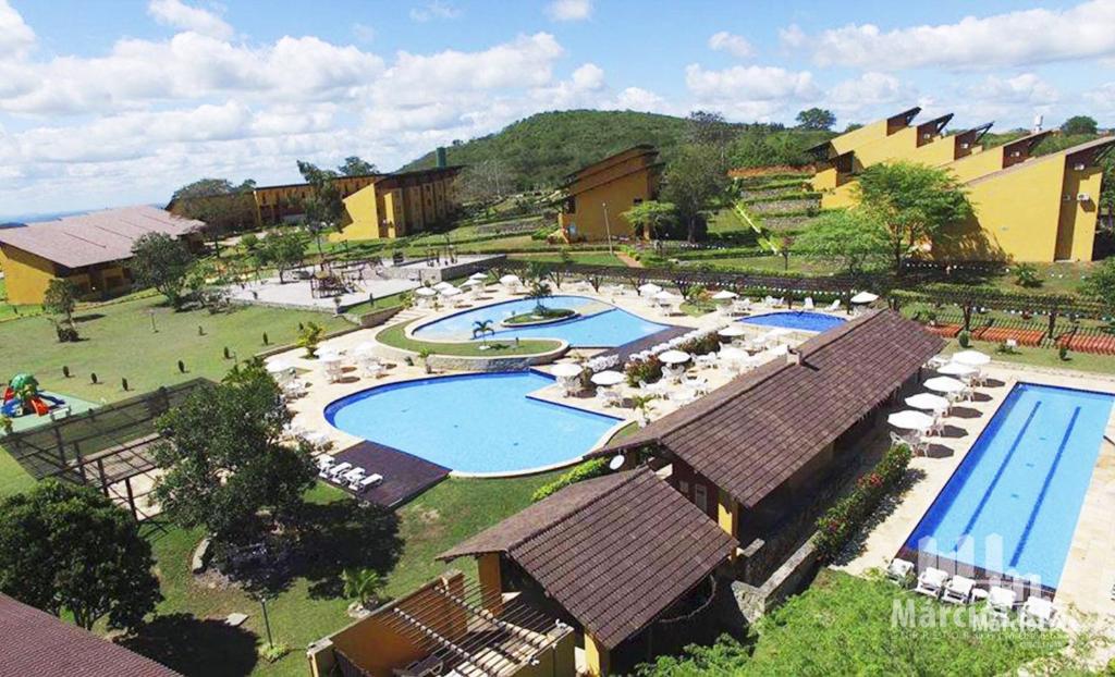 an aerial view of a resort with two swimming pools at Gravatá Winterville Residence in Gravatá