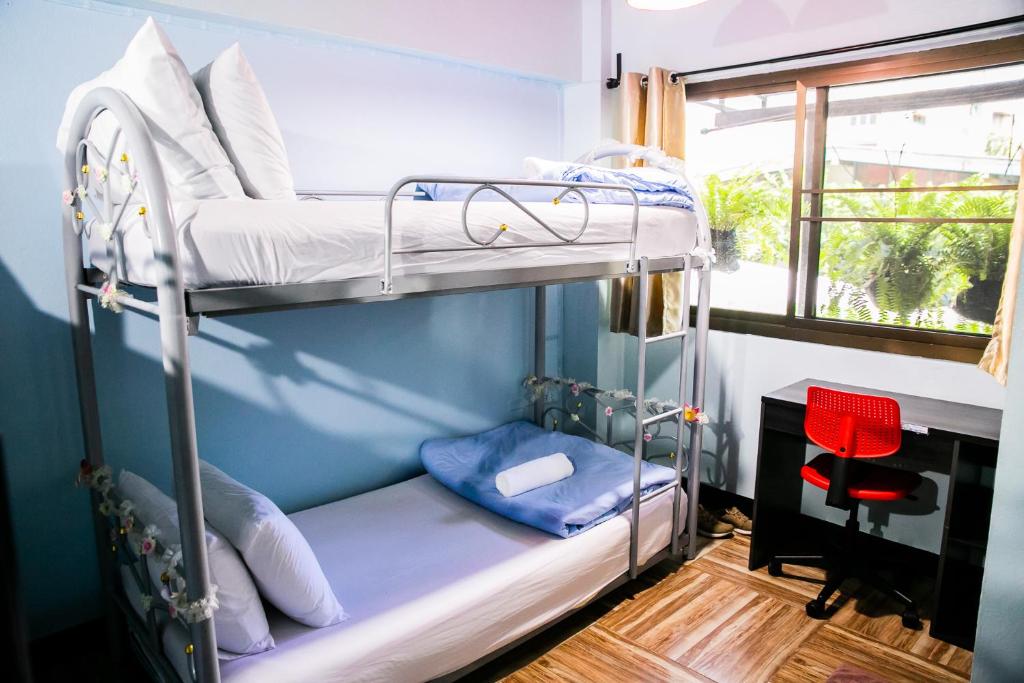 Postel nebo postele na pokoji v ubytování Bangkok Canale Home at Khaosarn