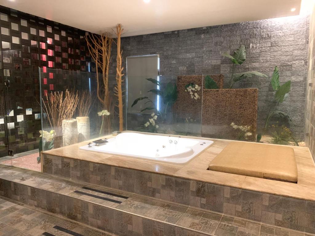 Koupelna v ubytování Her Home Spa Motel Douliu