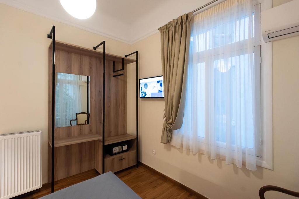 Telewizja i/lub zestaw kina domowego w obiekcie Blue Ark Lavish Sauna Suite