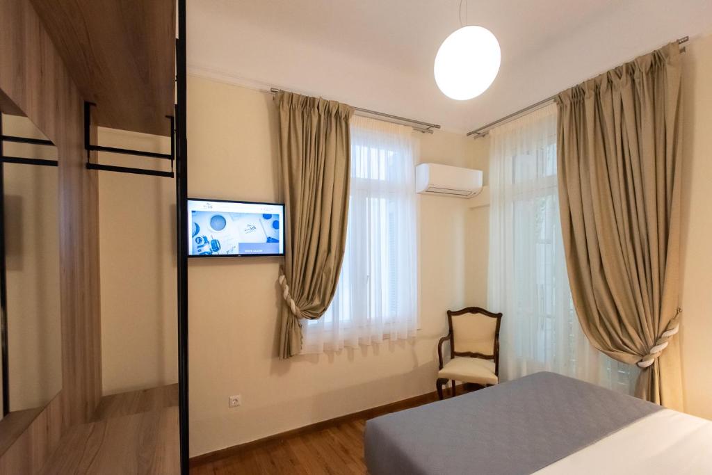 Łóżko lub łóżka w pokoju w obiekcie Blue Ark Lavish Sauna Suite