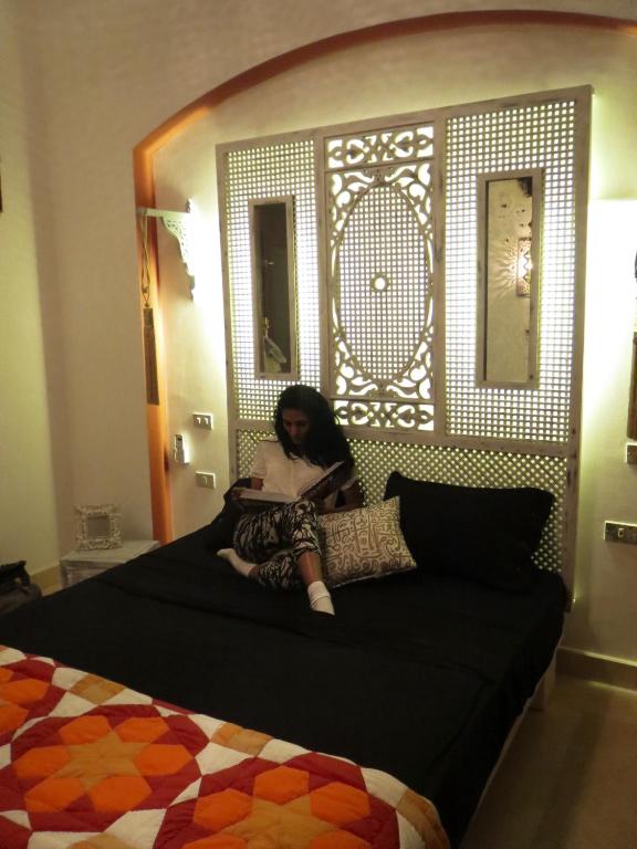 A bed or beds in a room at Beit Matta