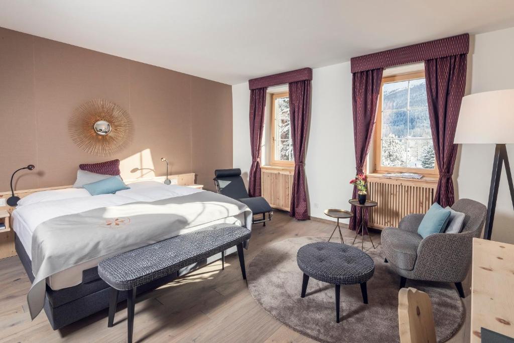 Postel nebo postele na pokoji v ubytování Parkhotel Margna Superior