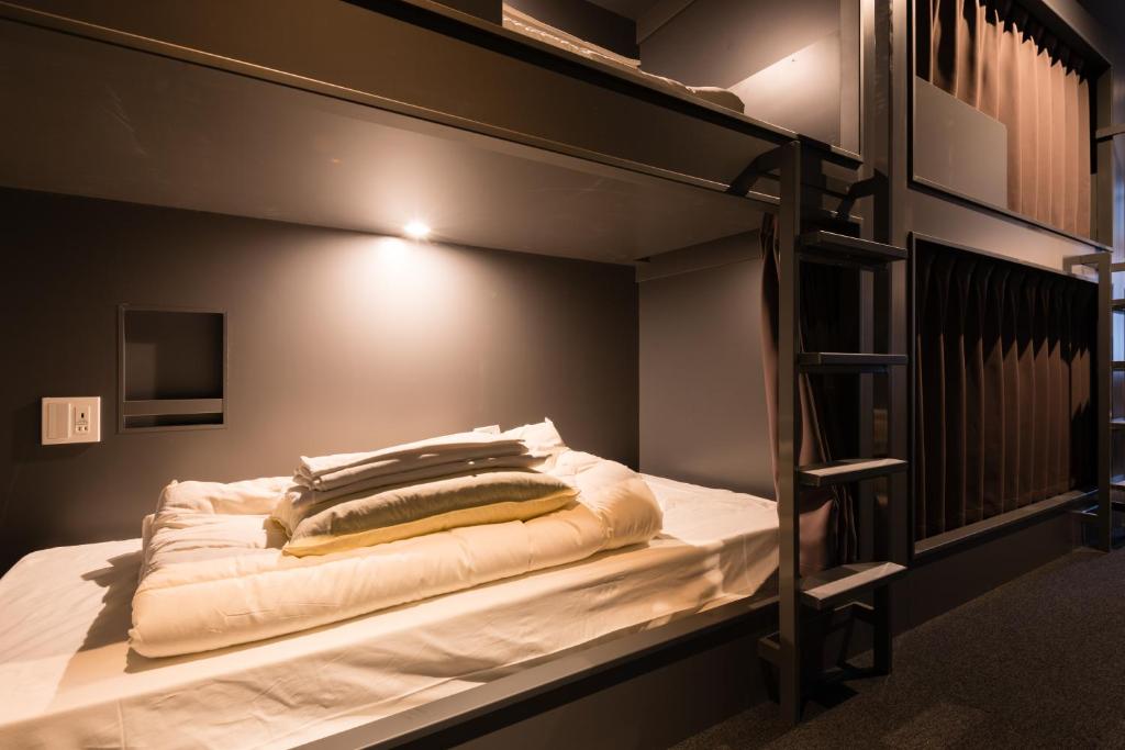 Postel nebo postele na pokoji v ubytování BON Hostel