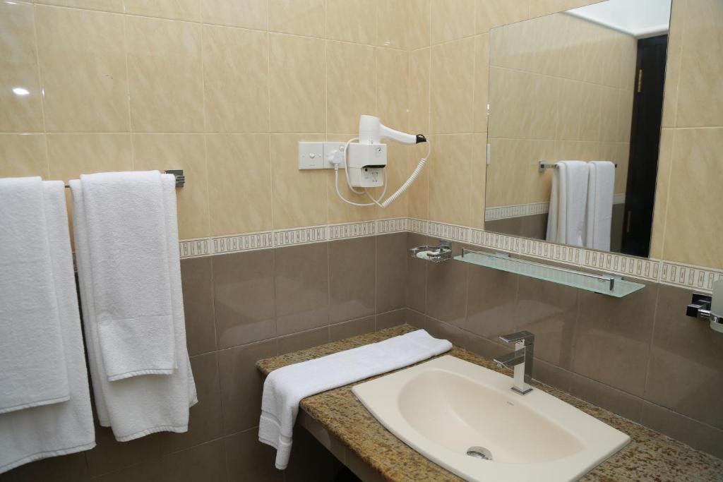 Koupelna v ubytování 3R Resort