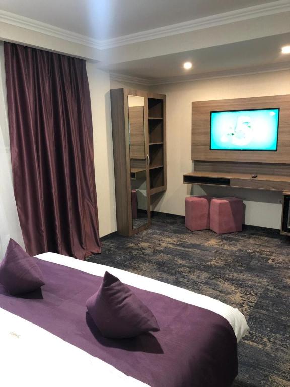 Postel nebo postele na pokoji v ubytování Hotel Yarus Plus