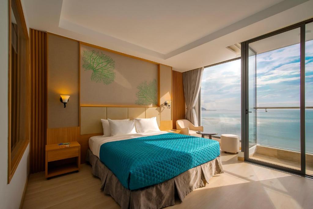Postel nebo postele na pokoji v ubytování Navada Beach Hotel