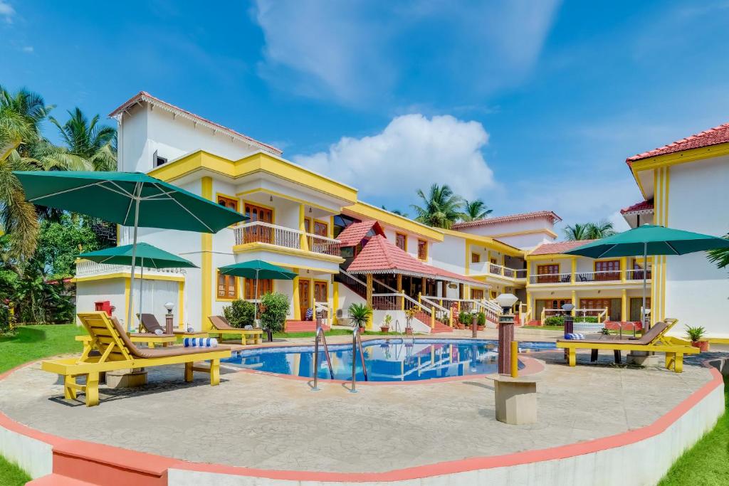 Bazén v ubytování Spazio Leisure Resort, Goa nebo v jeho okolí