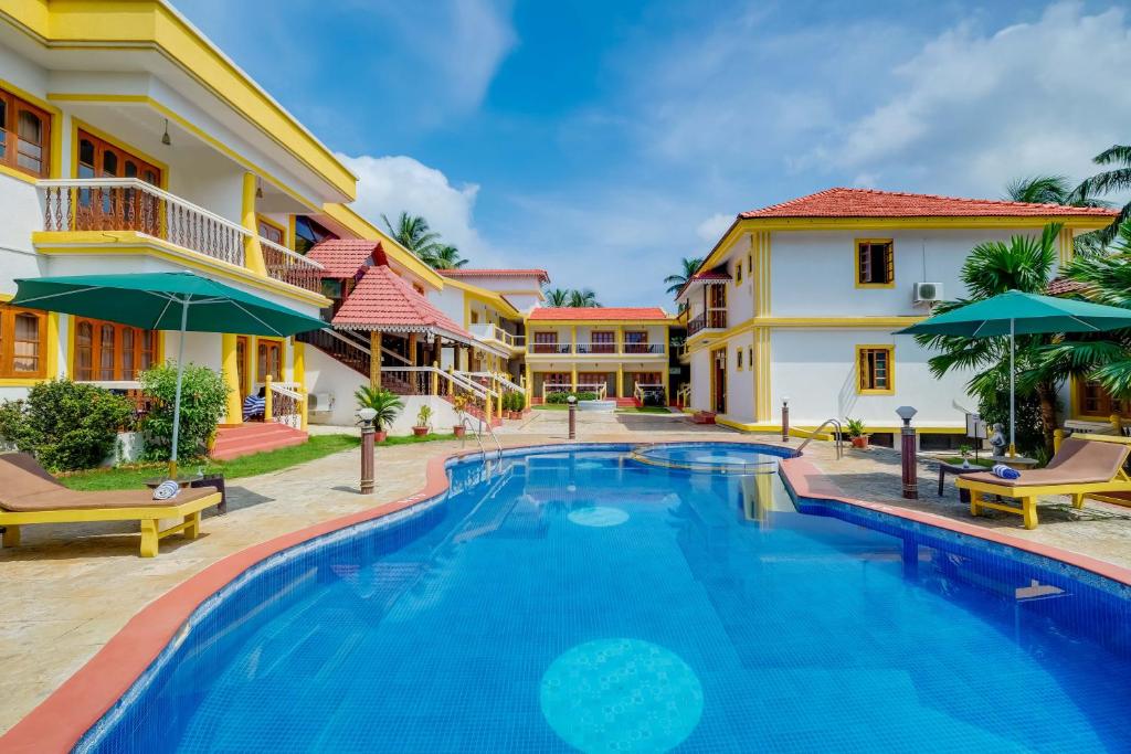Bazén v ubytování Spazio Leisure Resort, Goa nebo v jeho okolí
