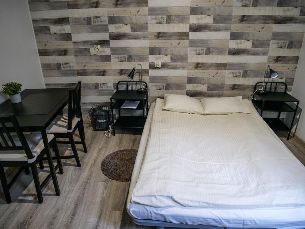 Posteľ alebo postele v izbe v ubytovaní Cent Hostel