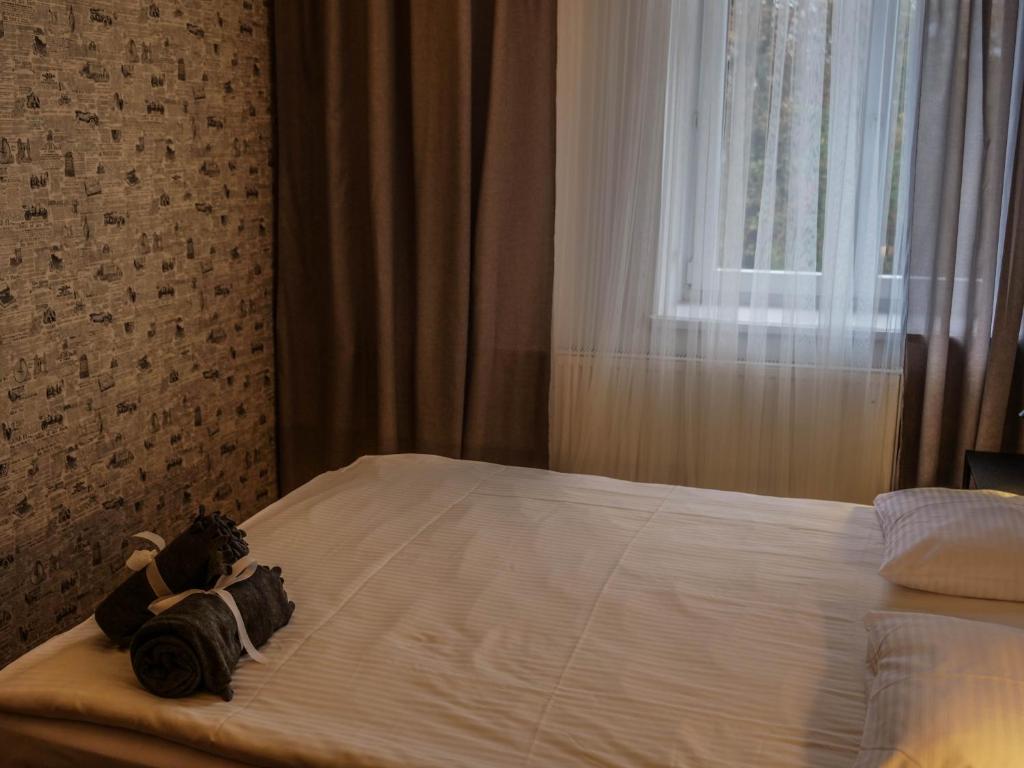 Posteľ alebo postele v izbe v ubytovaní Cent Hostel