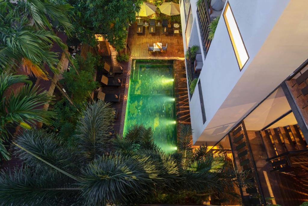 an overhead view of a building with a swimming pool at King Rock Boutique Hotel in Siem Reap