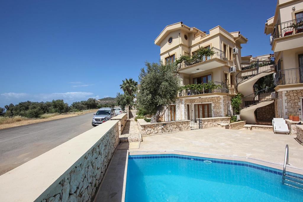 สระว่ายน้ำที่อยู่ใกล้ ๆ หรือใน Kleo Apartment Mediterranean Complex Kalkan