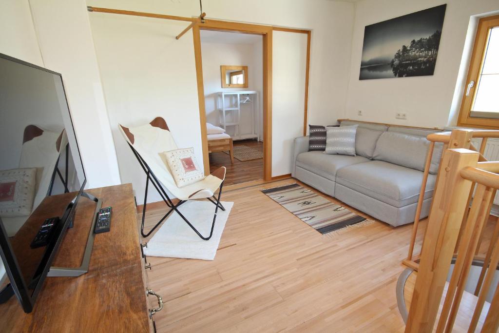 Televízia a/alebo spoločenská miestnosť v ubytovaní Appartement Ennst(h)aler by Schladming-Appartements