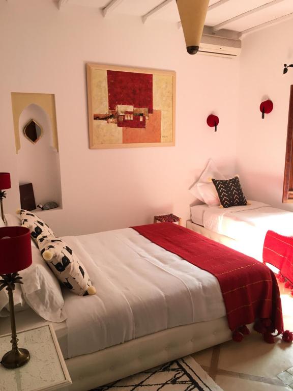 Postel nebo postele na pokoji v ubytování Riad Dar Kasal