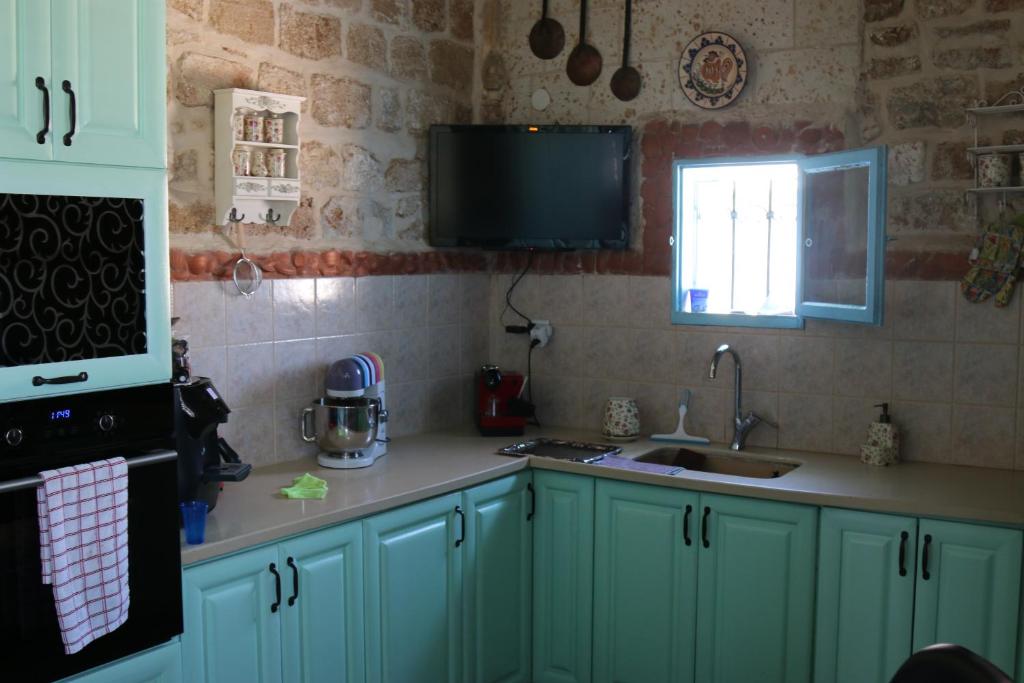 Kuchyň nebo kuchyňský kout v ubytování Jasmine House