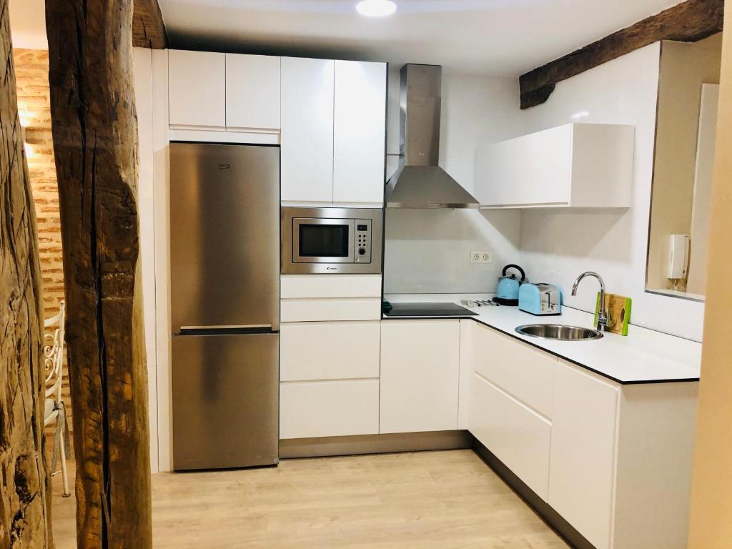 Kuchyň nebo kuchyňský kout v ubytování Lauramer Apartamento Bilbao