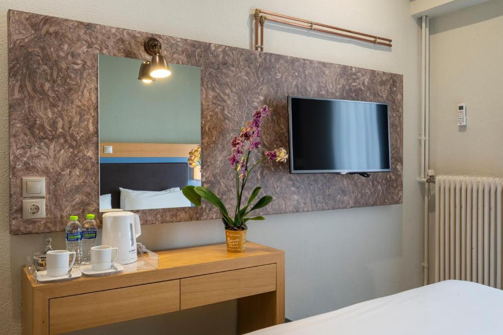 Postel nebo postele na pokoji v ubytování Kastalia Boutique Hotel