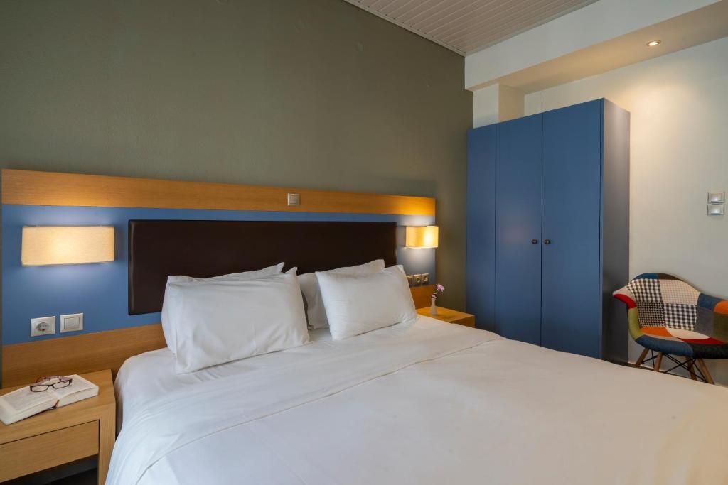 Postel nebo postele na pokoji v ubytování Kastalia Boutique Hotel