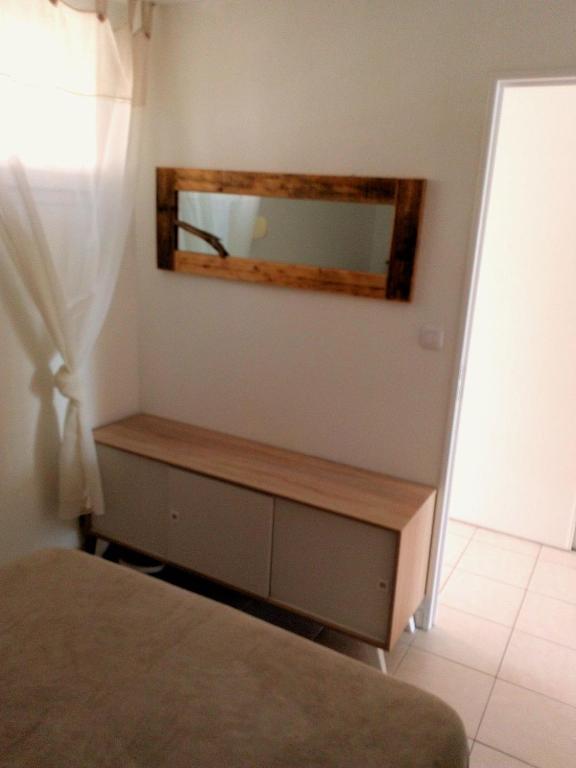 Postel nebo postele na pokoji v ubytování T3 VUE ETANG