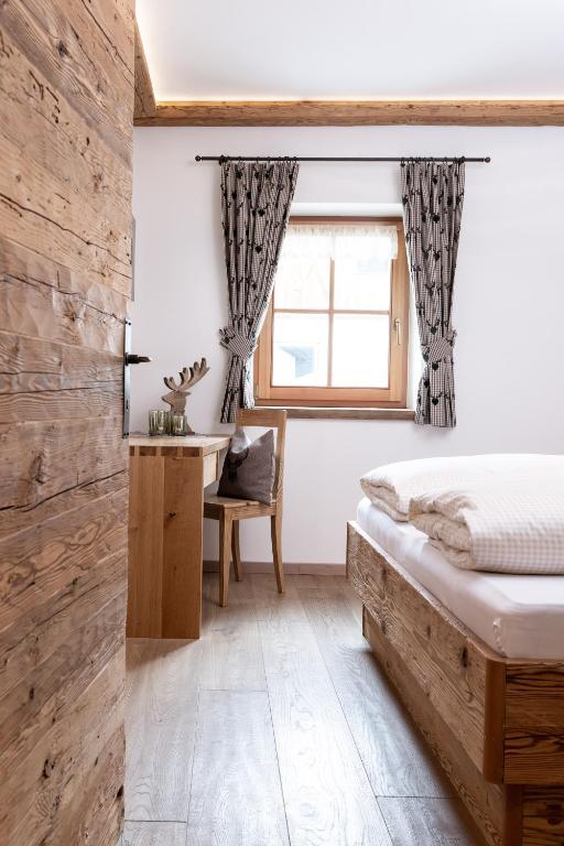 Postel nebo postele na pokoji v ubytování Loefflerhof