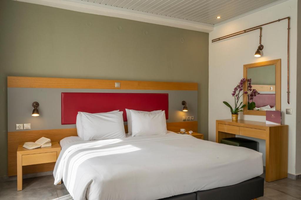 Postel nebo postele na pokoji v ubytování Kastalia Boutique Hotel