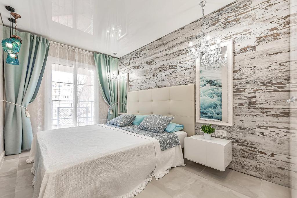 Posteľ alebo postele v izbe v ubytovaní Apartment Orlando Wave
