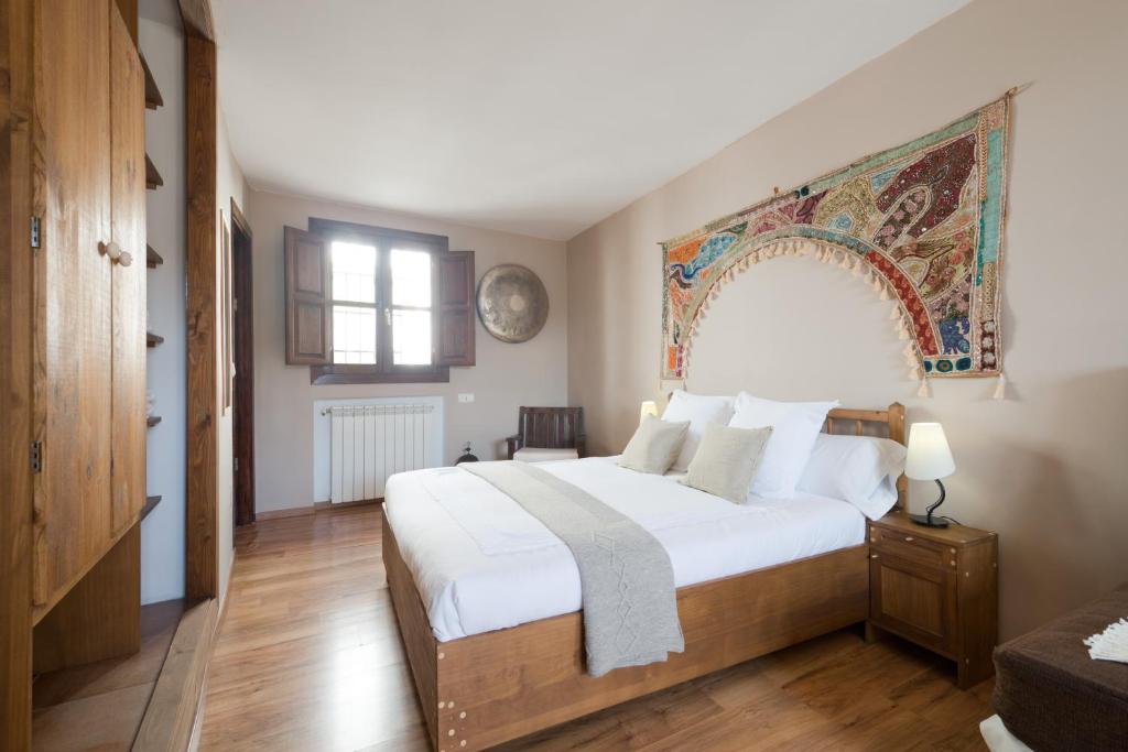 Postel nebo postele na pokoji v ubytování Casa Bombo