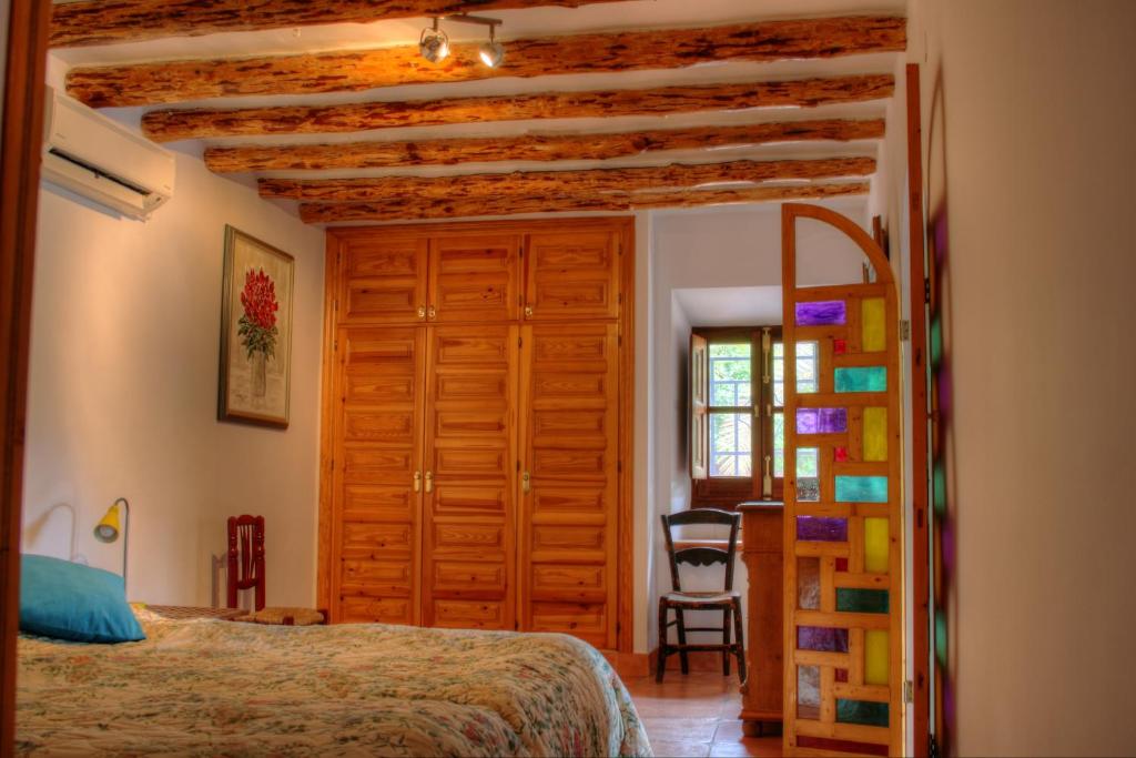 A bed or beds in a room at Finca el Regalo