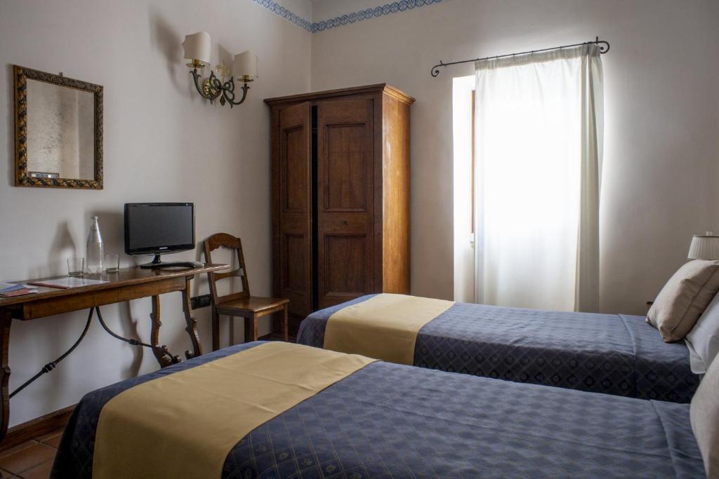 Posteľ alebo postele v izbe v ubytovaní B&B Le Cannelle FIESOLE