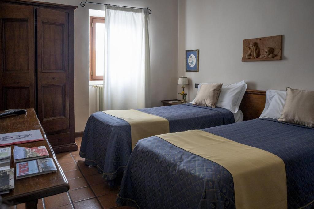 Posteľ alebo postele v izbe v ubytovaní B&B Le Cannelle FIESOLE
