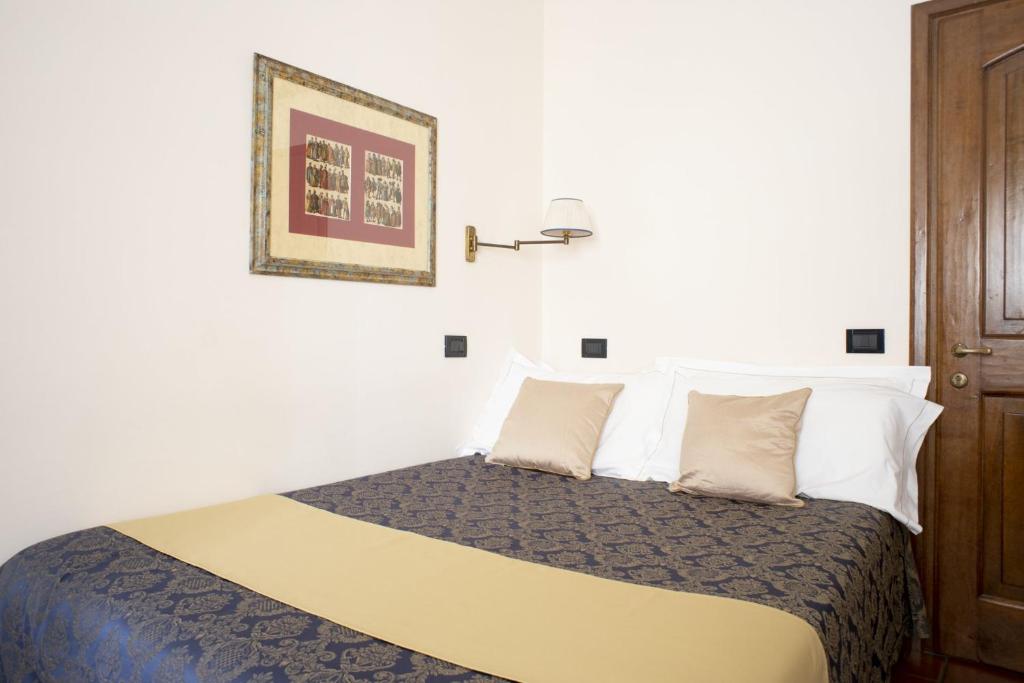 Posteľ alebo postele v izbe v ubytovaní B&B Le Cannelle FIESOLE