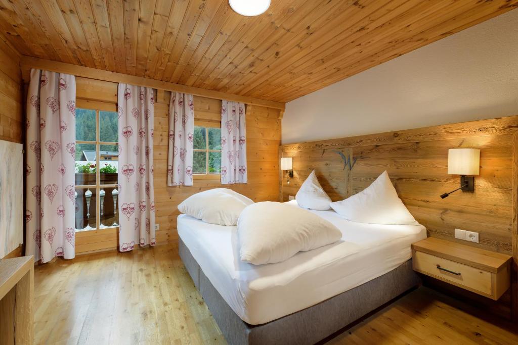 Postel nebo postele na pokoji v ubytování Walchauhof