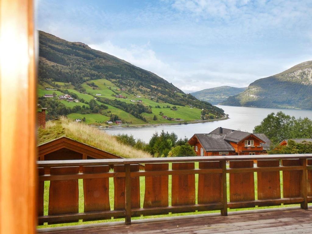 a view of a lake from a balcony of a house at Holiday home Olden V in Olden