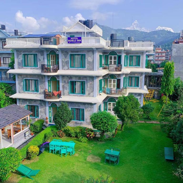 Garður fyrir utan Hotel Noble Inn花椒客栈