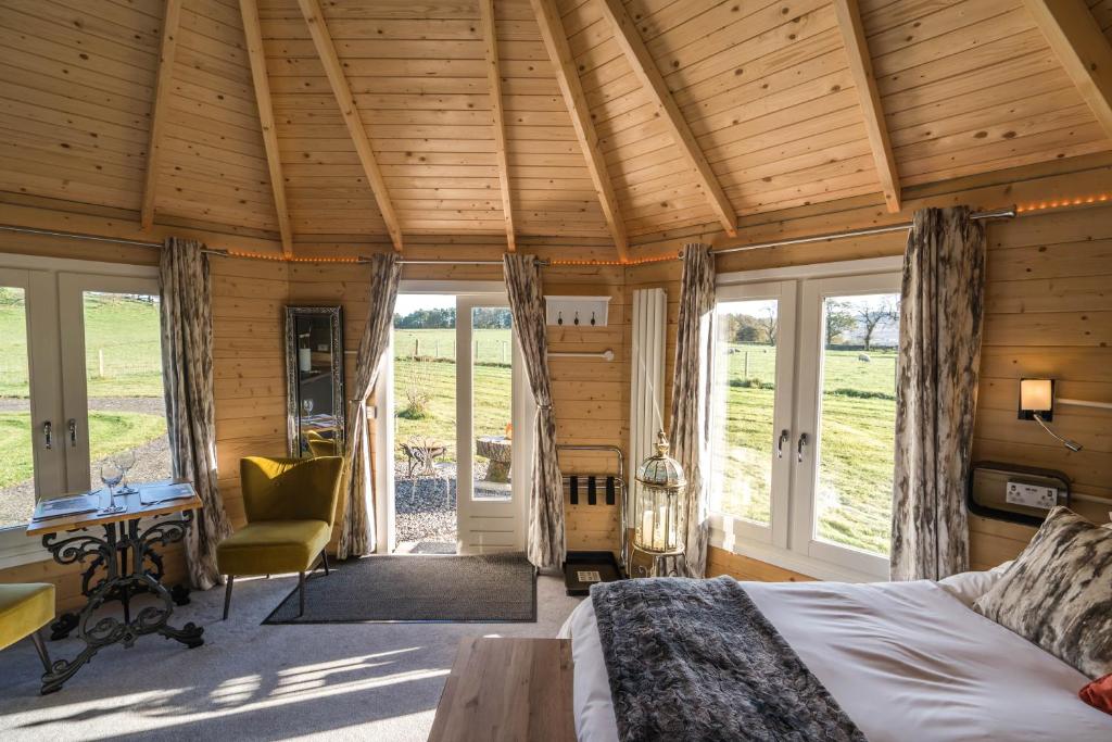 Postel nebo postele na pokoji v ubytování Dunroamin Lodges