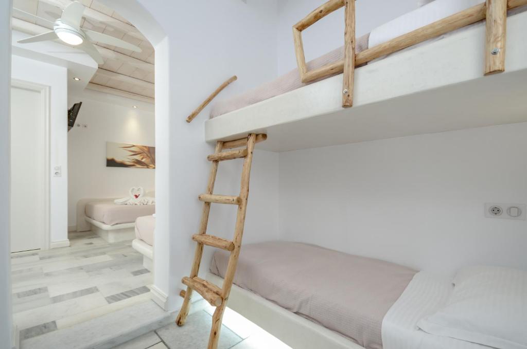 Posteľ alebo postele v izbe v ubytovaní Ostria Hotel