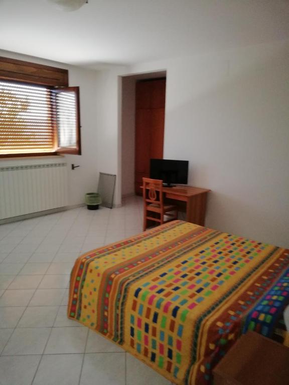 Posteľ alebo postele v izbe v ubytovaní Bed and Breakfast "POGGIO MARANO"