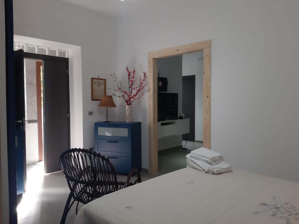 Łóżko lub łóżka w pokoju w obiekcie Casa Ary