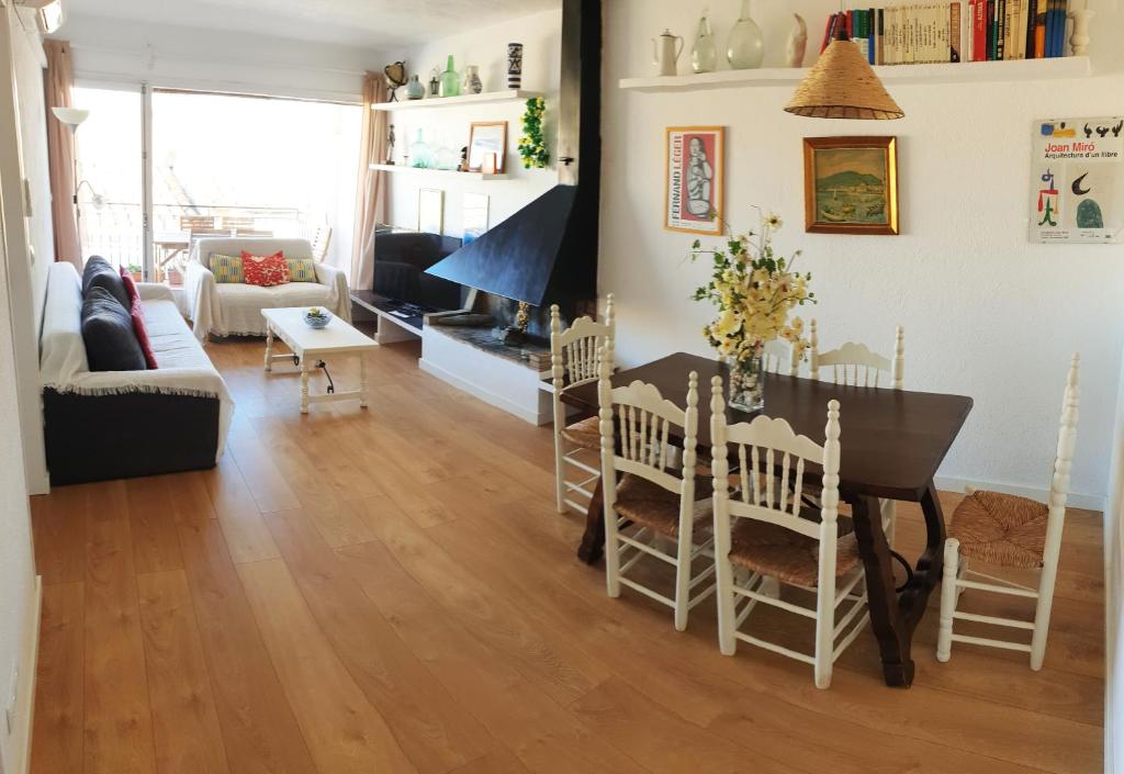 a living room with a table and a couch at Marquina in Cadaqués