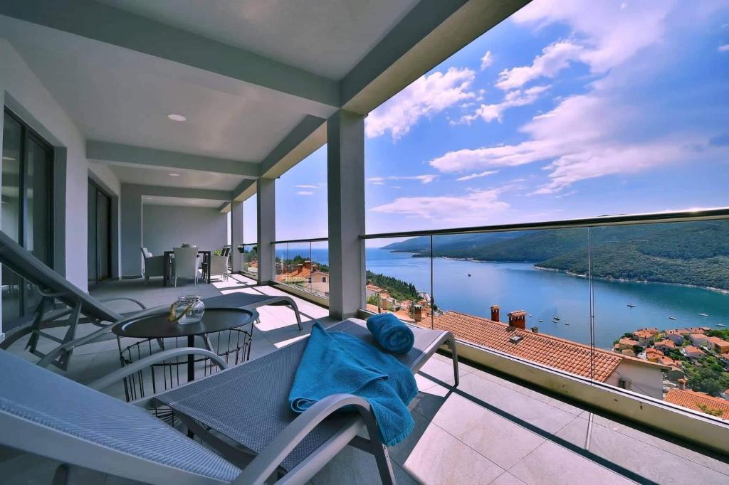 a balcony with a view of the water at Apartment Vanilla I with beautiful Seaview in Rabac