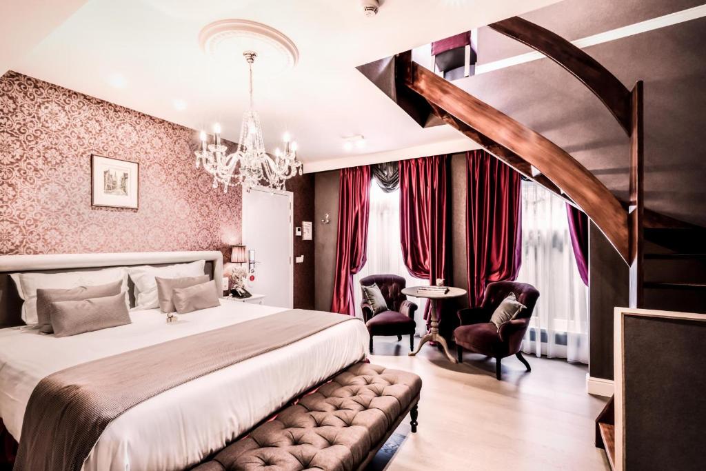 Postel nebo postele na pokoji v ubytování Boutique Hotel De Castillion