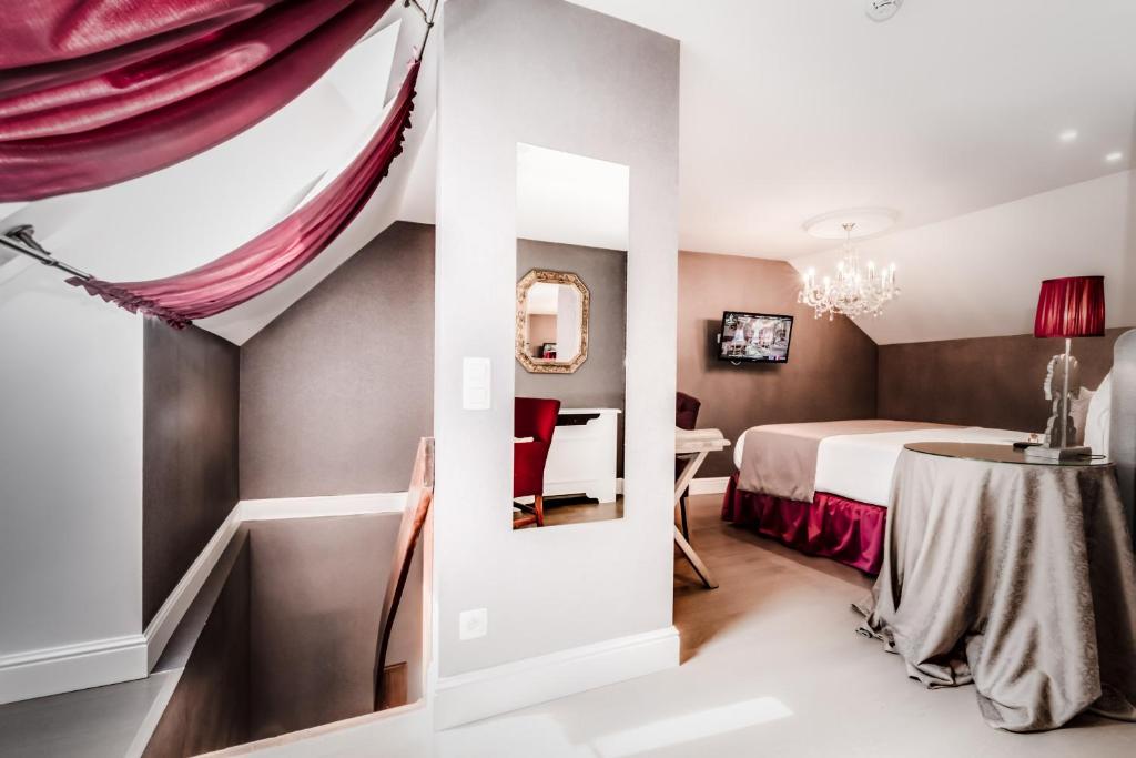Postel nebo postele na pokoji v ubytování Boutique Hotel De Castillion