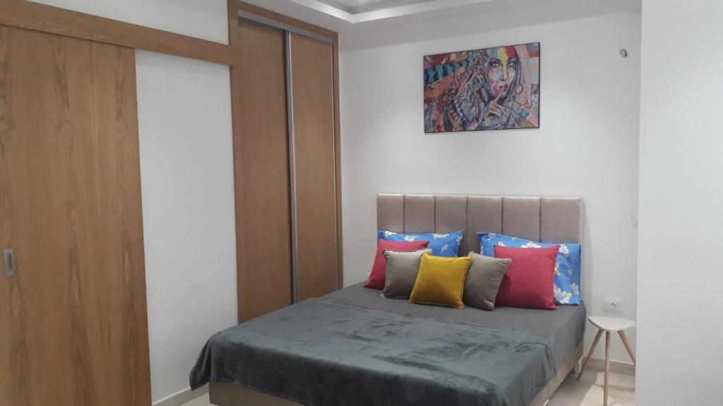 Postel nebo postele na pokoji v ubytování Appartement à La Marsa