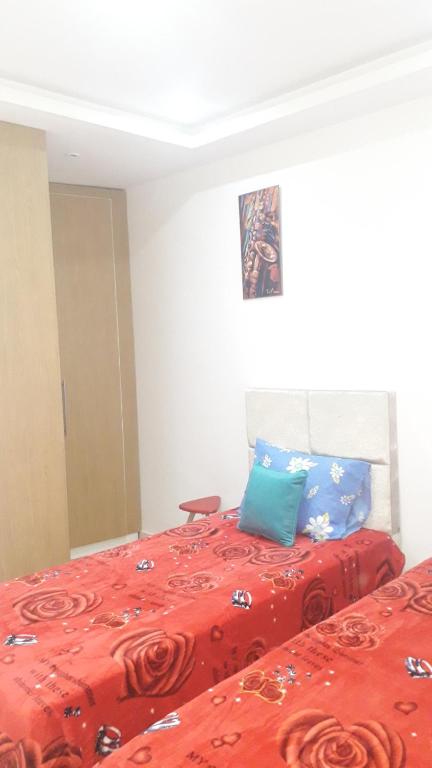 Postel nebo postele na pokoji v ubytování Appartement à La Marsa