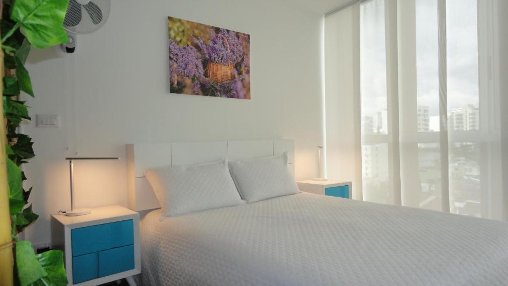 Postel nebo postele na pokoji v ubytování Apartamento Loft Edificio Soho 905