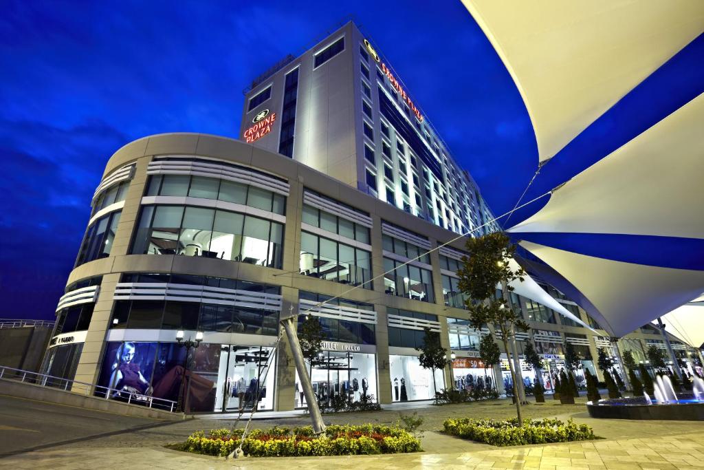 
a large building with a clock on the front of it at Crowne Plaza Istanbul Asia, an IHG Hotel in Istanbul
