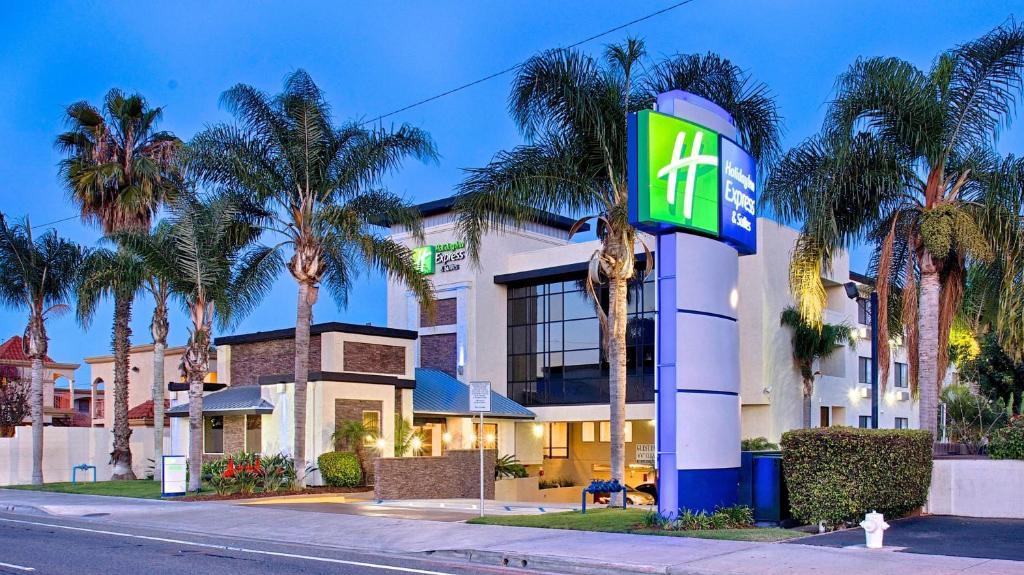 a mobil gas station with palm trees in front of it at Holiday Inn Express Costa Mesa, an IHG Hotel in Costa Mesa